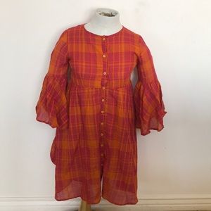 Orange checked emberley dress.